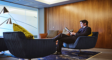 Businessman in Platinum Services suite Businessman in Platinum Services suite